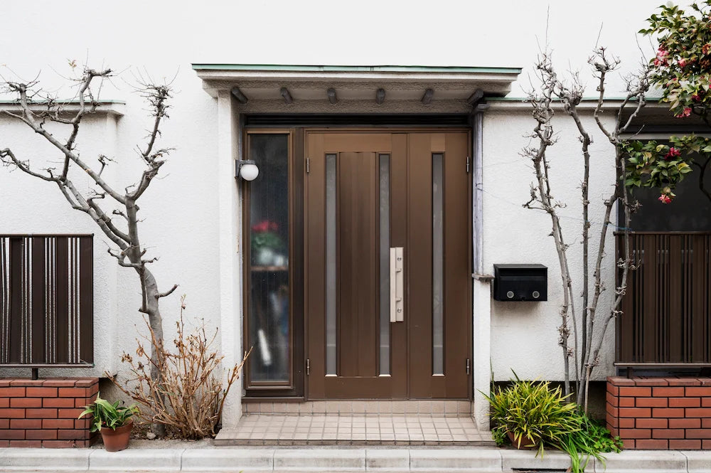 Exterior iron doors on modern home